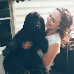 baus canine bowen woman holding dog pet health